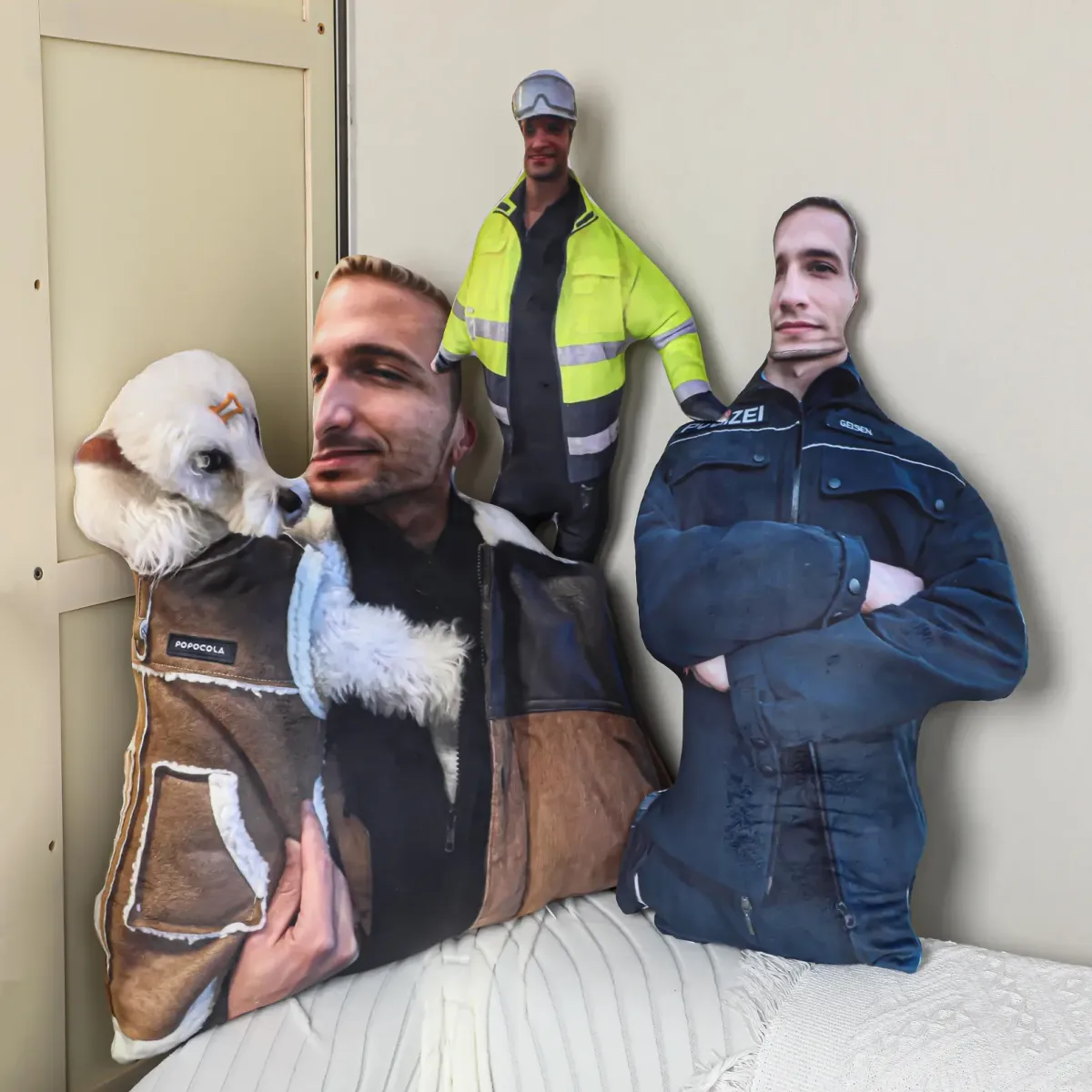 Full body pillows of two friends and a dog